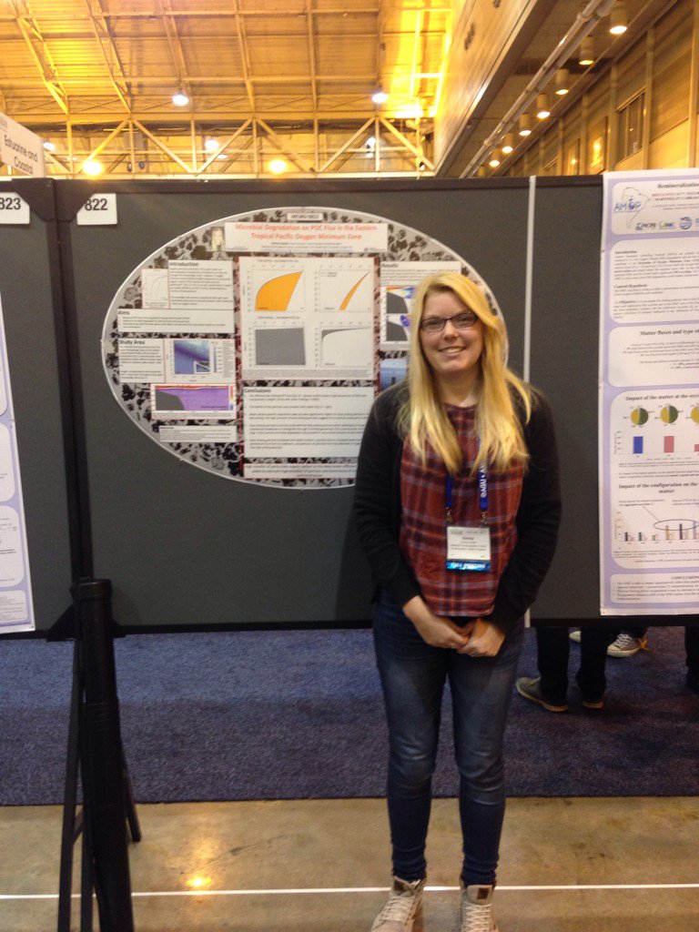 Me standing next to the only oval poster at the conference!
